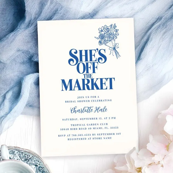 Bridal shower invitation with bold blue text reading “She’s Off the Market” and a hand-drawn bouquet illustration.